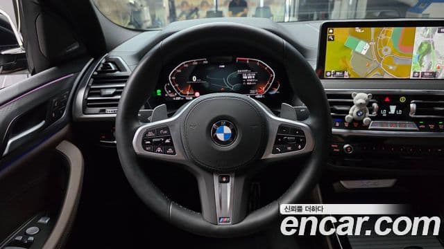 BMW X4 2025 — ფოტო 13/20