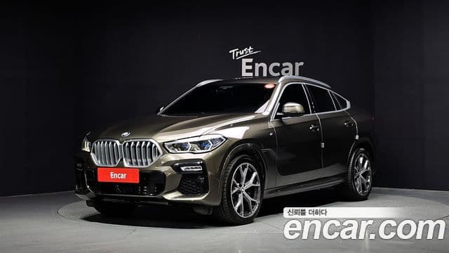 BMW X6 2021 — Фото 1/20