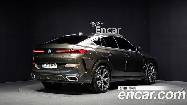 BMW X6 2021 — Фото 2/20