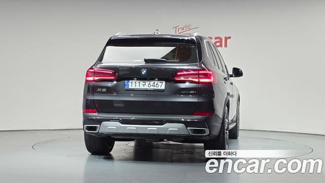 BMW X5 2023 — ფოტო 4/20