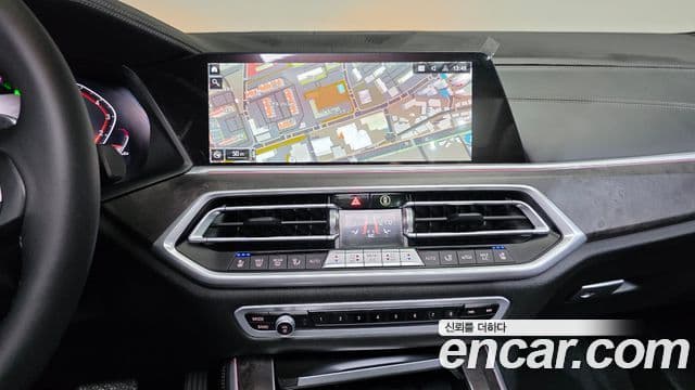 BMW X5 2023 — ფოტო 13/20