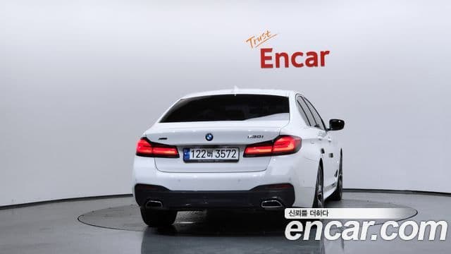 BMW 5 Series 2023 — ფოტო 4/20