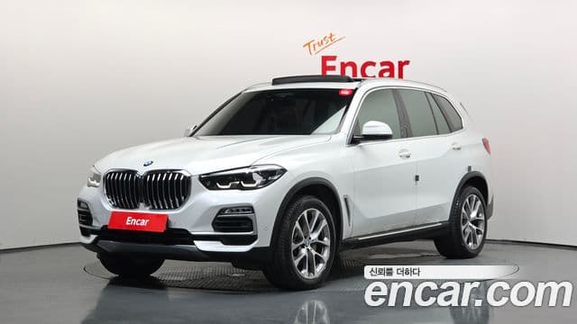 BMW X5 2019 — ფოტო 1/20