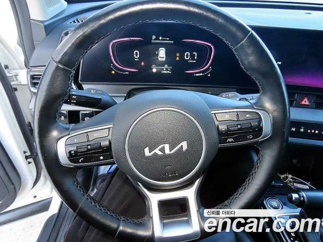 Kia Sportage 2022 — ფოტო 7/19
