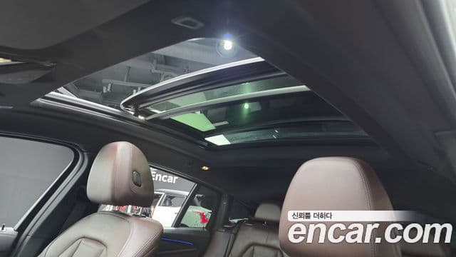 BMW X4 2024 — ფოტო 14/20