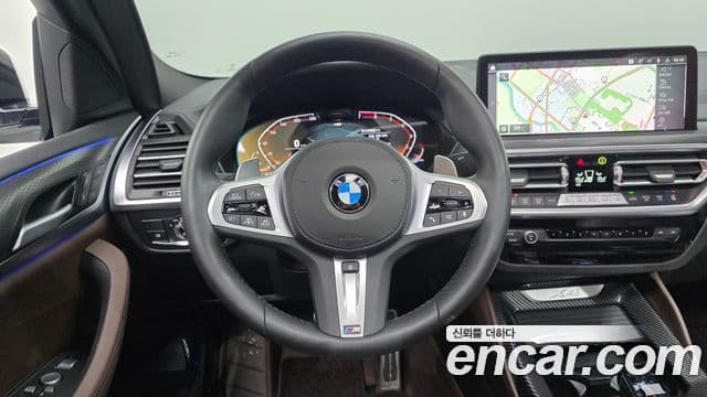 BMW X4 2024 — ფოტო 15/20