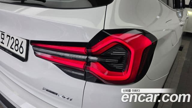 BMW X3 2022 — Photo 14/32