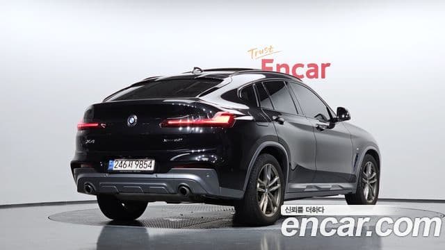 BMW X4 2021 — Фото 2/20
