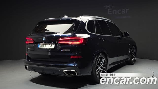 BMW X5 2022 — ფოტო 1/20
