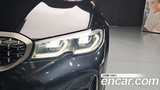 BMW 3 Series 2021 — ფოტო 20/34
