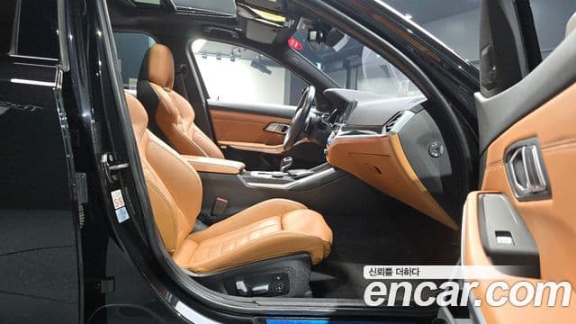 BMW 3 Series 2021 — ფოტო 24/34