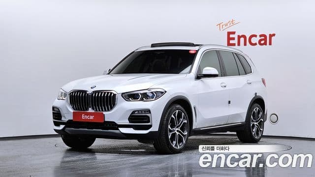 BMW X5 2021 — Фото 1/20
