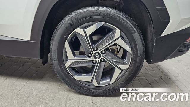 Hyundai Tucson Hybrid 2021 — ფოტო 6/30