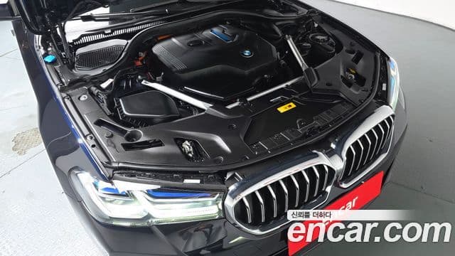 BMW 5 Series 2023 — ფოტო 6/20