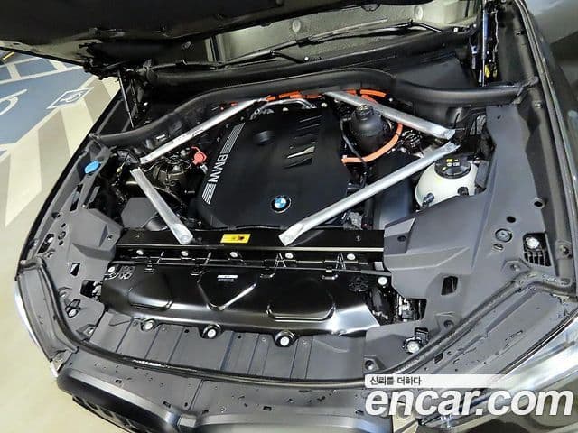 BMW X5 2024 — ფოტო 18/20