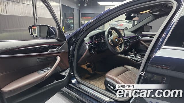 BMW 5 Series 2023 — ფოტო 10/20