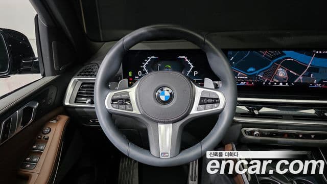 BMW X5 2025 — ფოტო 13/20