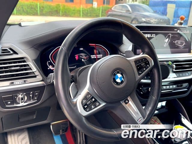 BMW X4 2024 — ფოტო 10/20