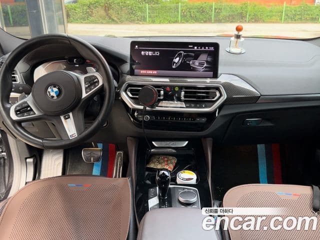 BMW X4 2024 — ფოტო 14/20