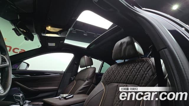 BMW 5 Series 2022 — ფოტო 19/20