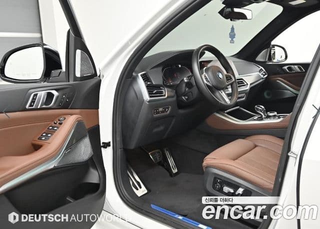 BMW X5 2021 — ფოტო 10/20