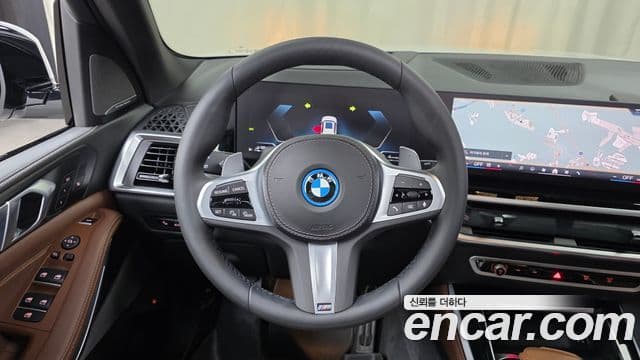 BMW X5 2025 — ფოტო 14/20