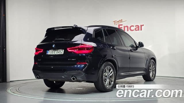 BMW X3 2021 — ფოტო 2/20