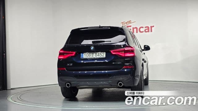 BMW X3 2021 — ფოტო 4/20