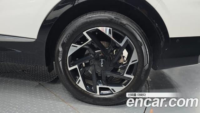 Kia Sportage 2022 — ფოტო 4/20