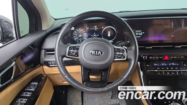Kia Carnival 2021 — ფოტო 13/20