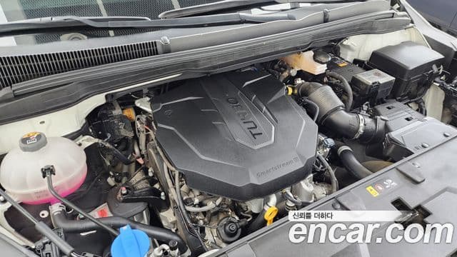 Kia Carnival 2023 — ფოტო 6/20