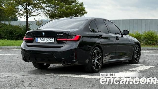 BMW 3 Series 2022 — ფოტო 1/20