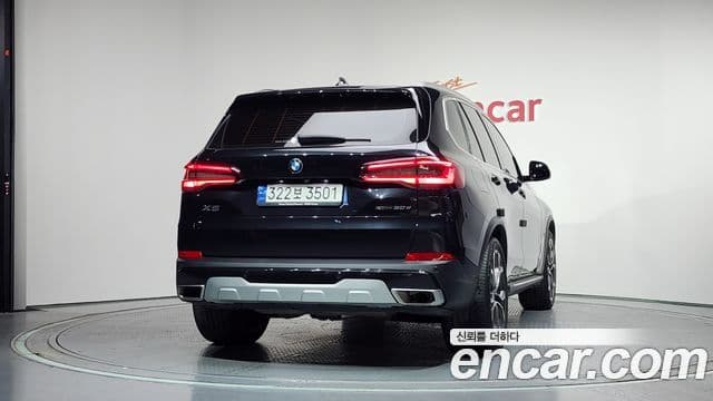 BMW X5 2023 — ფოტო 4/20