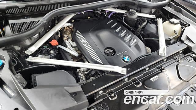 BMW X5 2023 — ფოტო 6/20