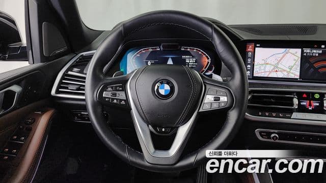 BMW X5 2023 — ფოტო 13/20