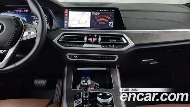 BMW X5 2023 — ფოტო 14/20
