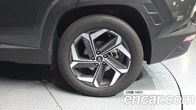 Hyundai Tucson Hybrid 2023 — ფოტო 4/34
