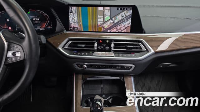 BMW X5 2020 — ფოტო 7/31