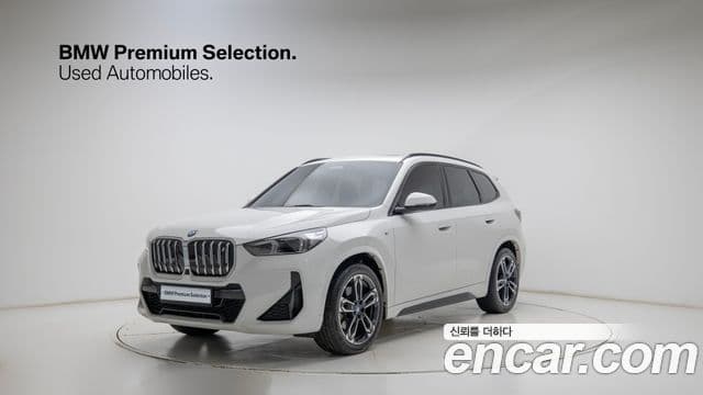 BMW iX1 2023 — ფოტო 4/20
