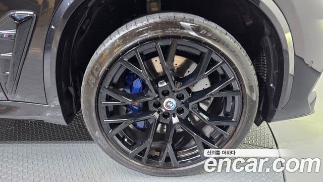 BMW X5 2023 — ფოტო 4/20