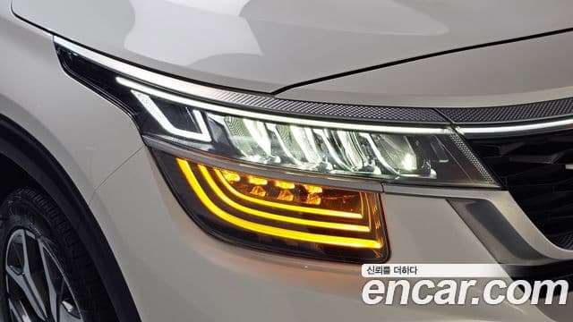 Kia Seltos 2021 — ფოტო 27/34