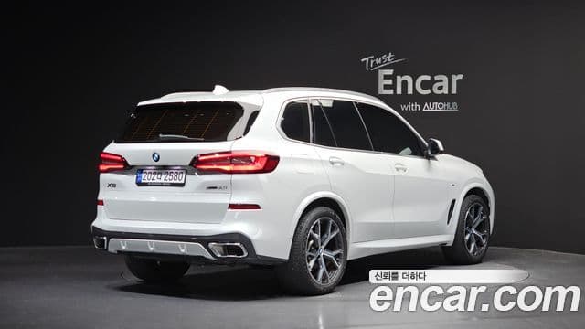 BMW X5 2023 — ფოტო 1/20