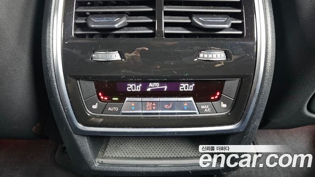 BMW X5 2023 — ფოტო 18/20