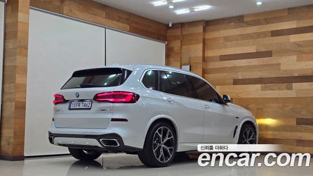 BMW X5 2022 — Фото 1/20