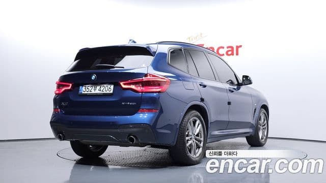 BMW X3 2021 — ფოტო 1/20