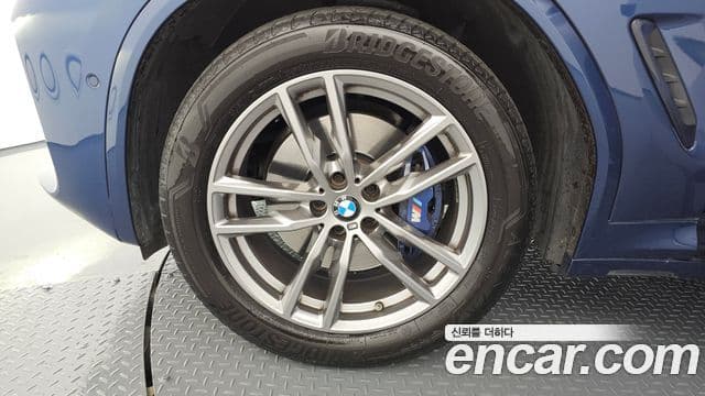 BMW X3 2021 — ფოტო 4/20