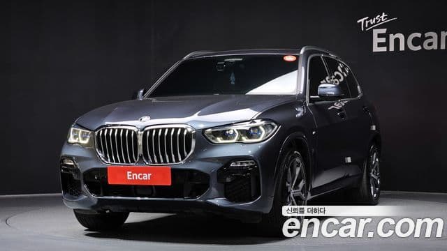 BMW X5 2021 — ფოტო 1/20