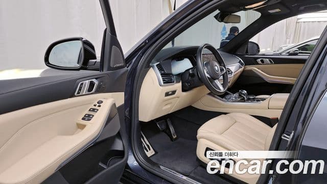 BMW X5 2021 — ფოტო 10/20