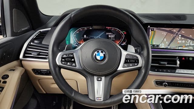 BMW X5 2021 — ფოტო 13/20