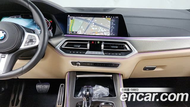 BMW X5 2021 — ფოტო 14/20